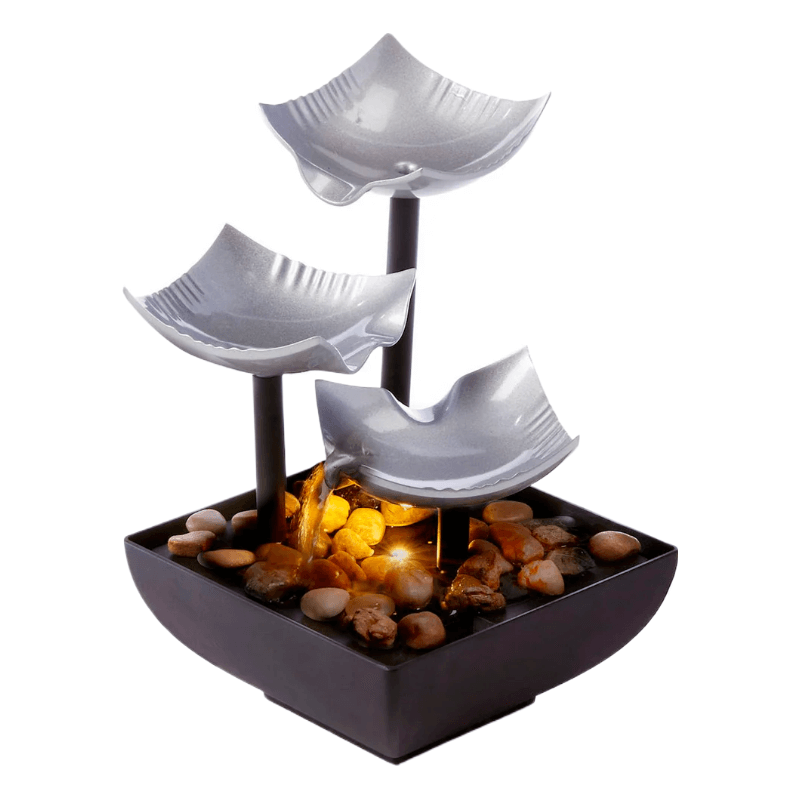 3-tier black and silver table fountain with LED light and decorative pebbles for a serene atmosphere.