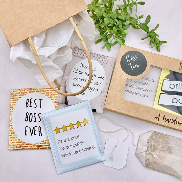 Boss Tea gift set with greeting cards, teabags in handmade envelopes, and decorative gift bag.