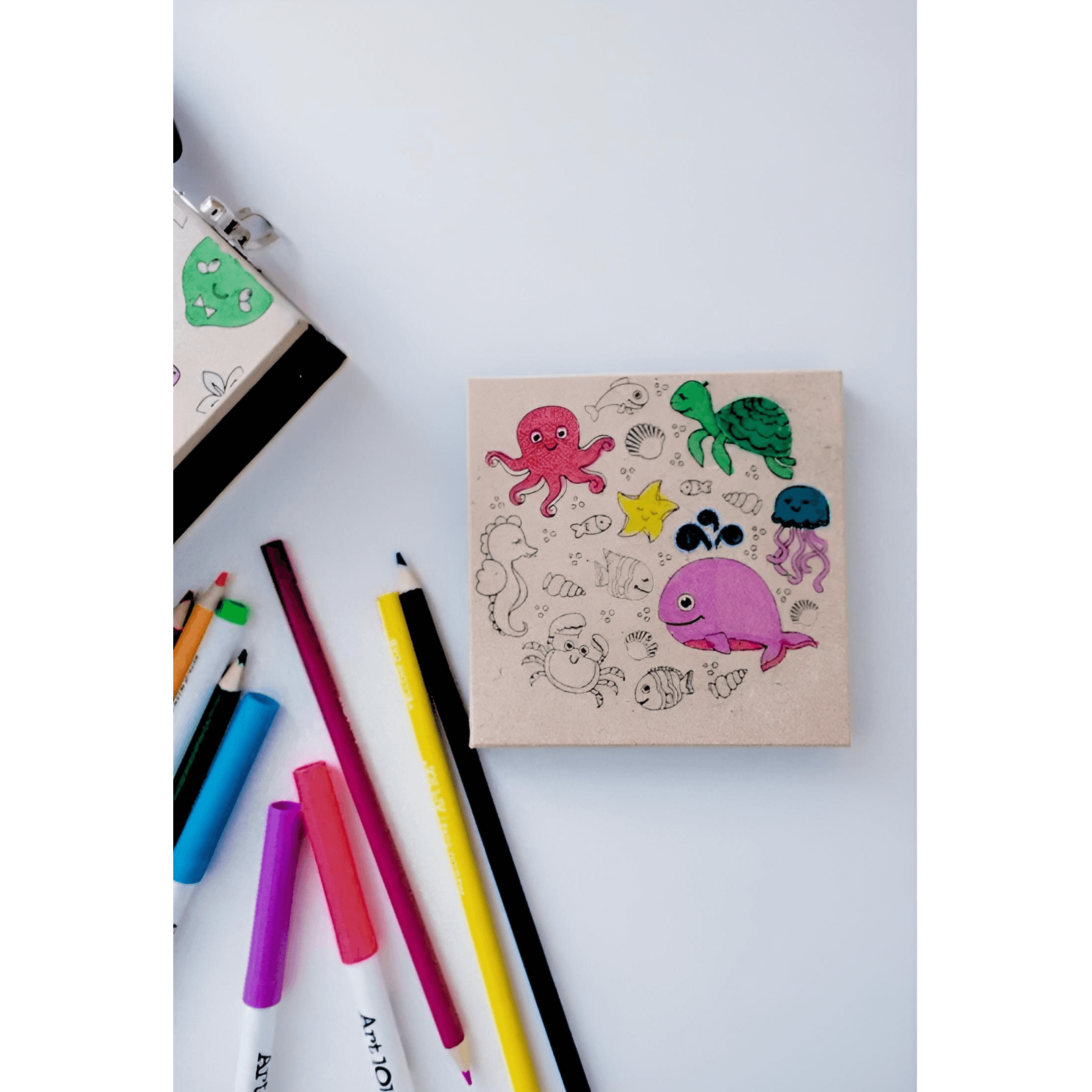 Art 101 Budding Artist 33 Piece Doodle & Create Colorable Art Set with colorful drawings and art supplies.