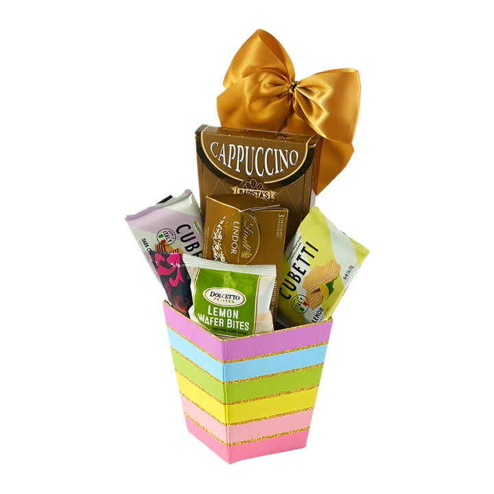 Cappuccino Supreme Gift Basket with assorted treats and a golden bow, perfect gift for coffee lovers.