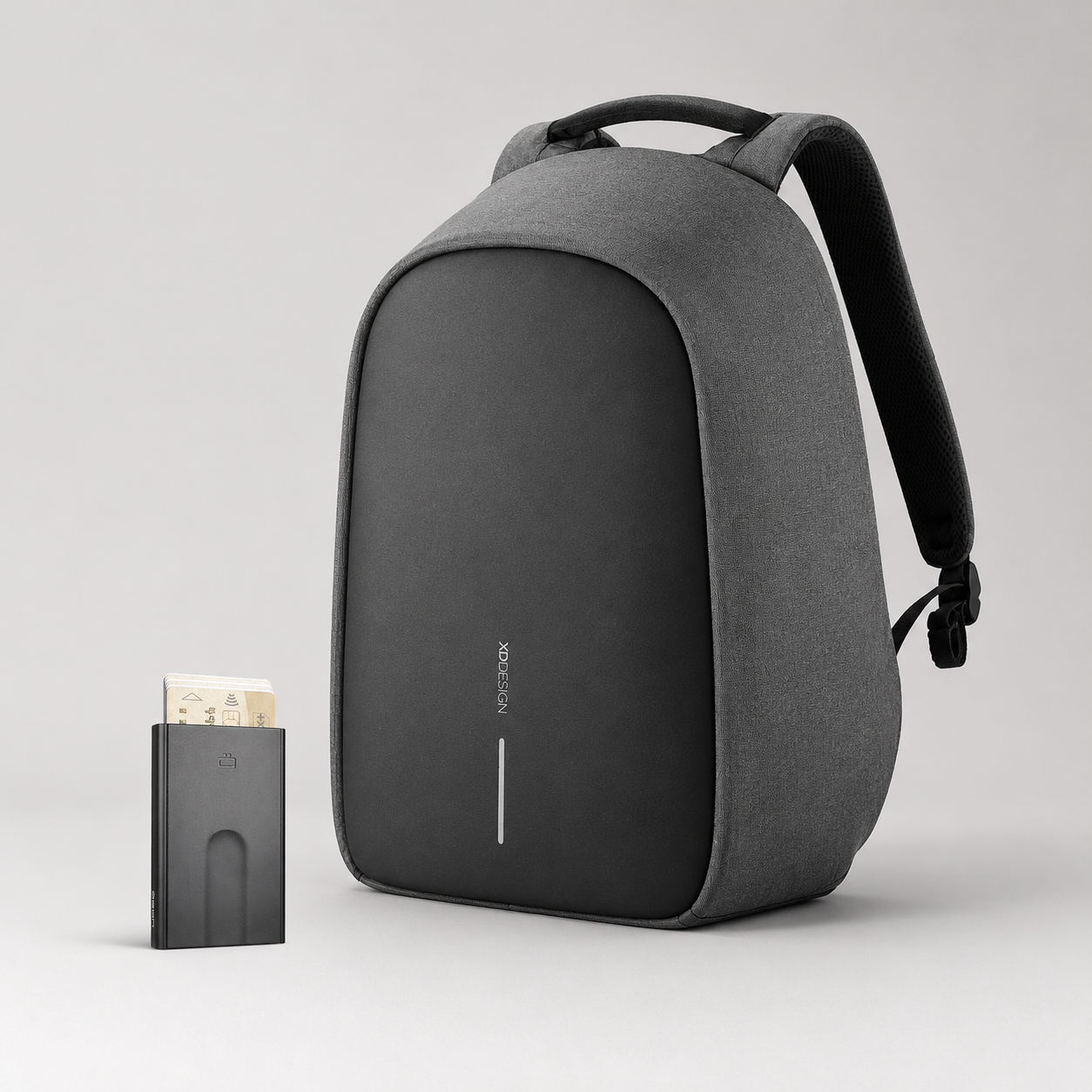 Anti-Theft Backpack and Aluminum Wallet Set featuring grey backpack and aluminum wallet