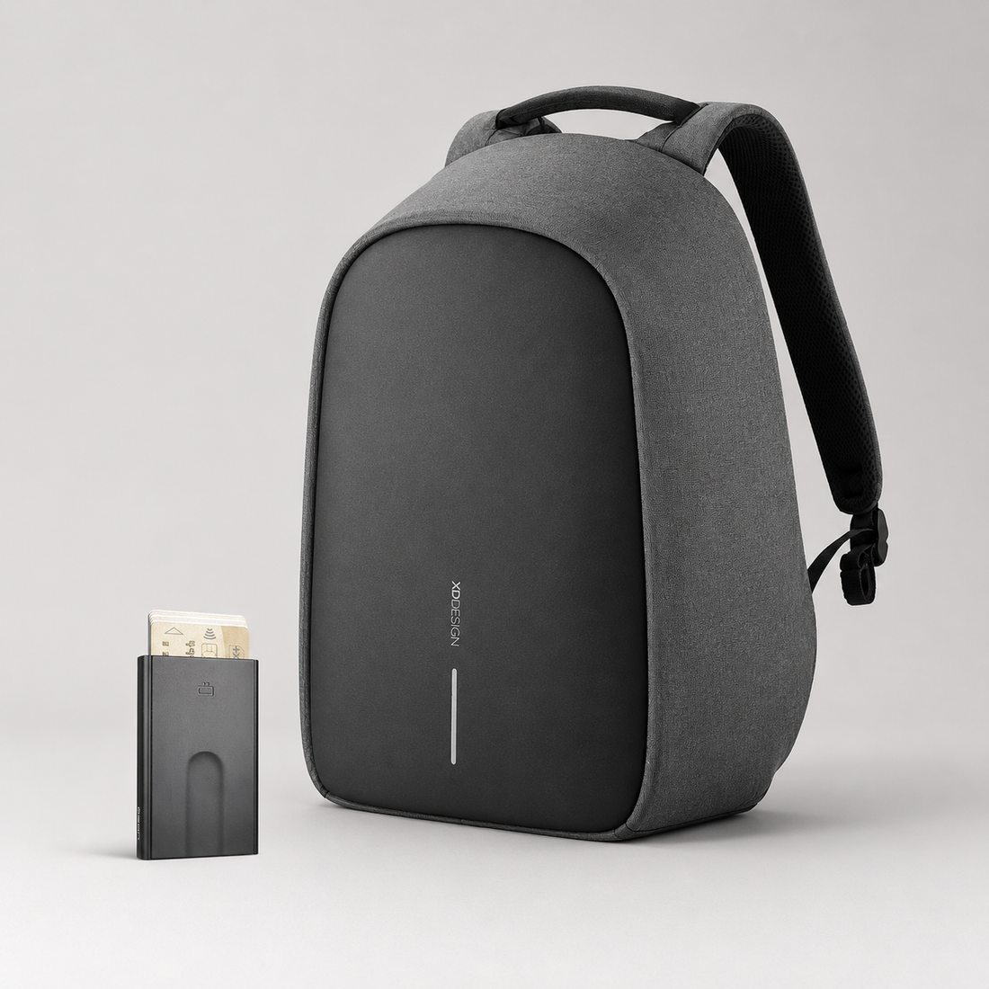 Anti-Theft Backpack and Aluminum Wallet Set featuring grey backpack and aluminum wallet