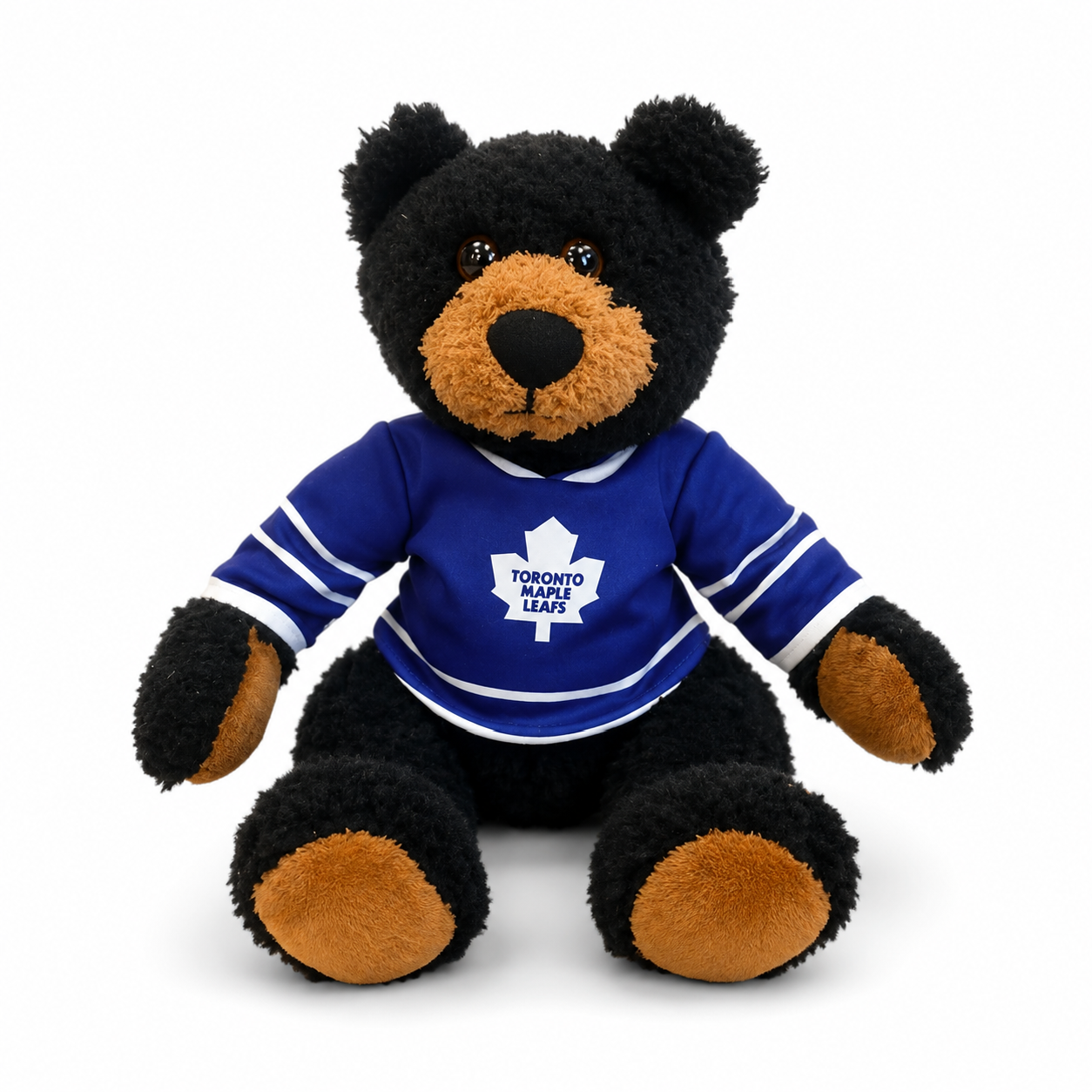 Plush bear wearing a Toronto Maple Leafs jersey on a white background