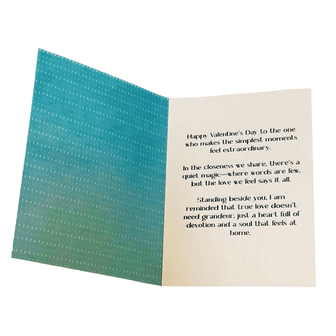 Open Evergreen Embrace Valentine’s Day card with heartfelt message celebrating love and connection.