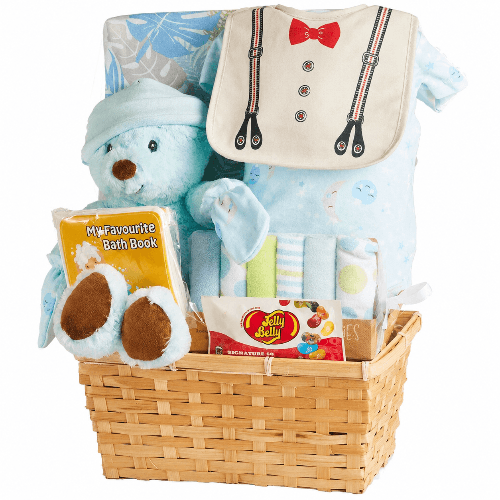 Hello Baby Boy gift basket with a blue plush bear, blue baby clothing, bow-tie bib, washcloths, receiving blanket, bath book and Jelly Belly candy in a bamboo basket.