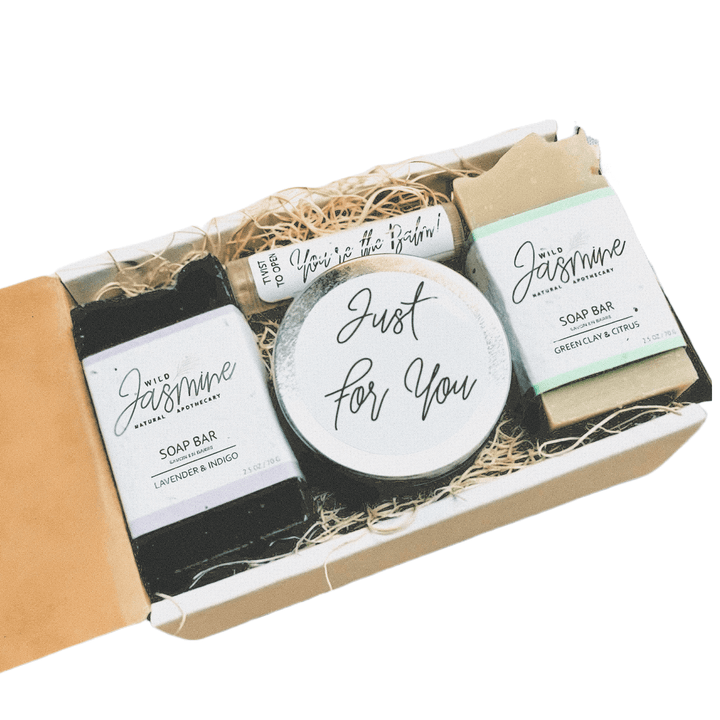 Gift set with soap bars and a round item in a box labeled 'Just For You'.