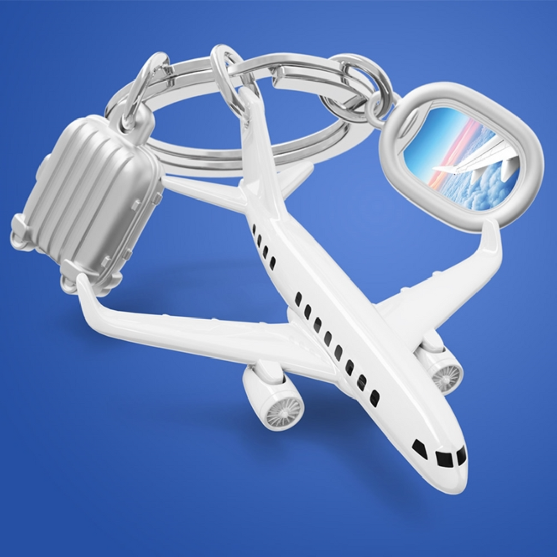 Keychain shaped like an airplane with a suitcase and map on a blue background