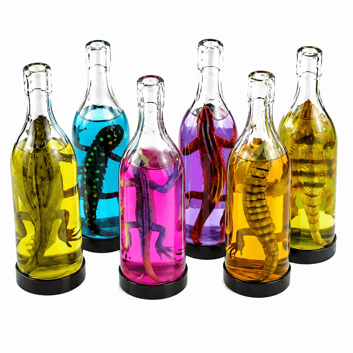 Lizard Slime in a Bottle – Magic Mud Sensory Slime Toy with Lizard Figure in assorted bright colors.