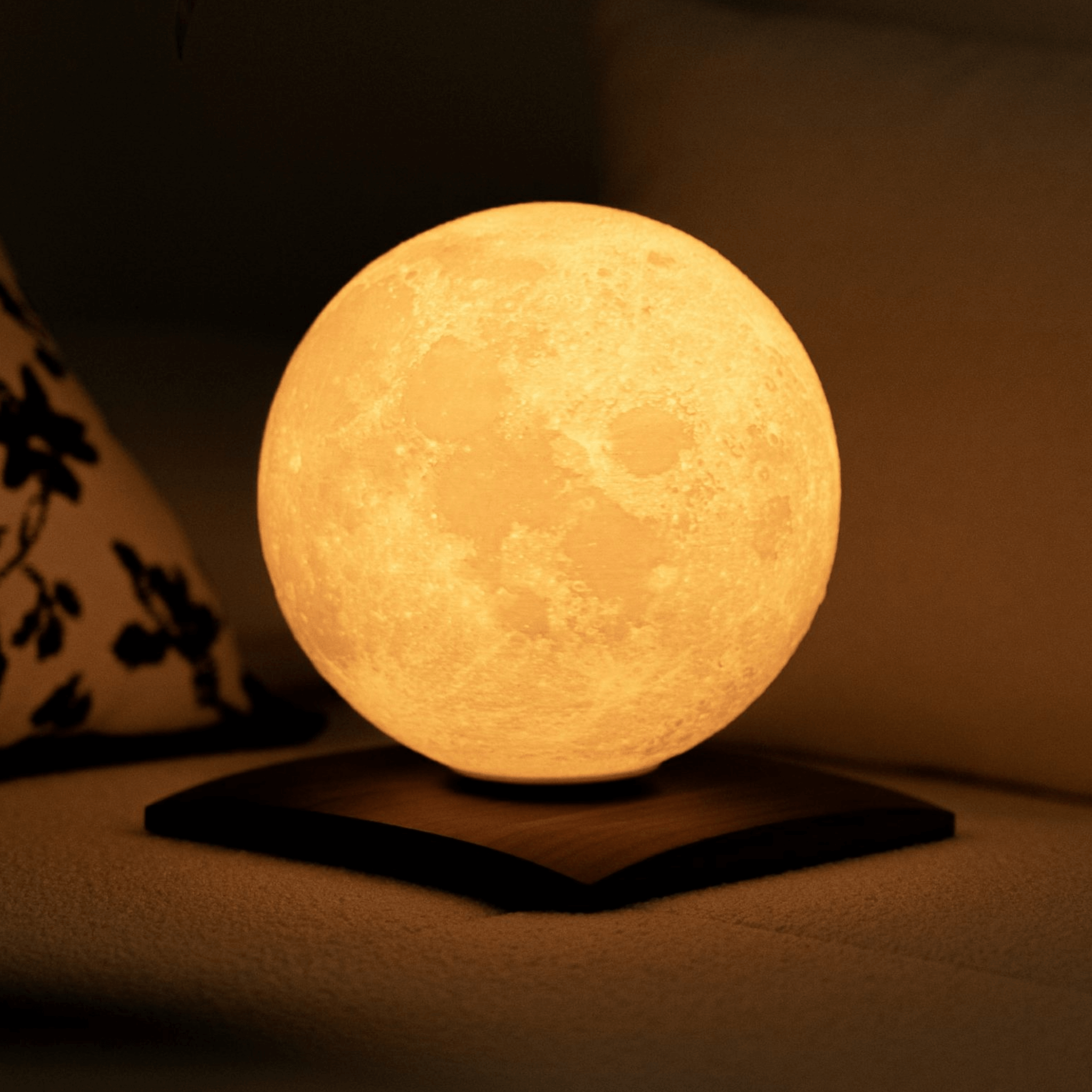 LunaSpin Mini Lamp illuminating a cozy space with a realistic glowing moon design.