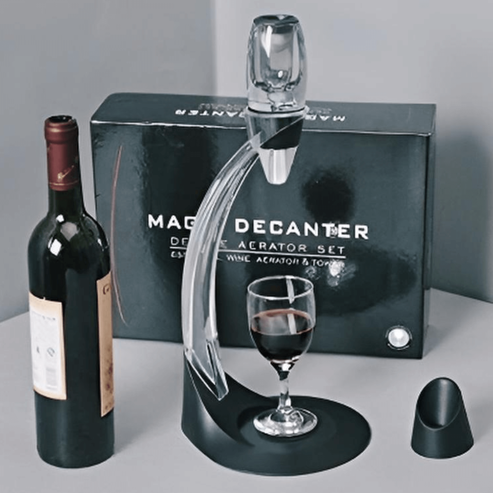 Magic Wine Decanter Set with aerator, wine glass, red wine bottle, box and stand for easy serving and aeration.