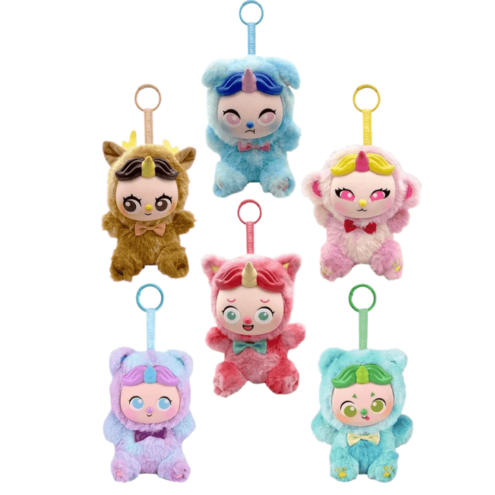Six small plush character keychains arranged on a plain white background. Each plush has a soft fuzzy body, a stylized face, and a colored loop at the top for attaching to a bag or keychain.