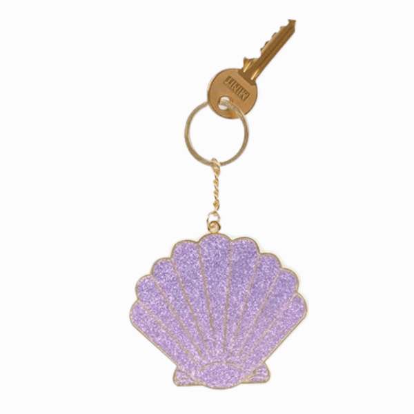Oversized Shell Keychain featuring a glittery purple metal seashell pendant with a keyring.