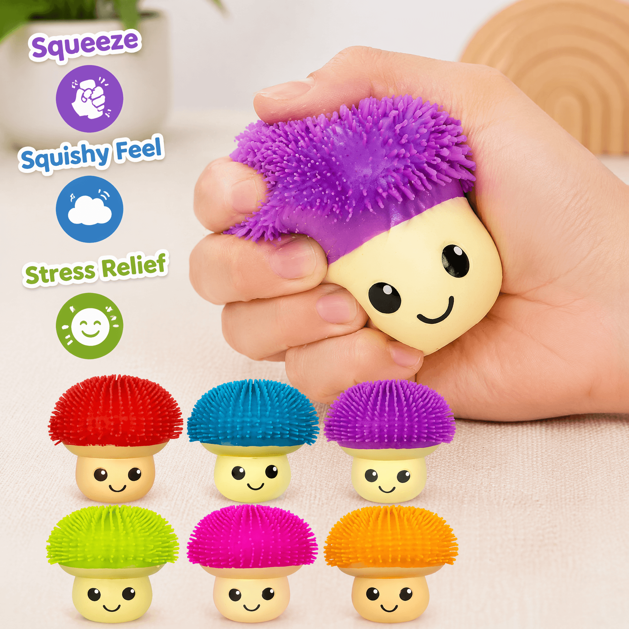 Colorful mushroom-shaped stress relievers with a hand squeezing one, on a light background.