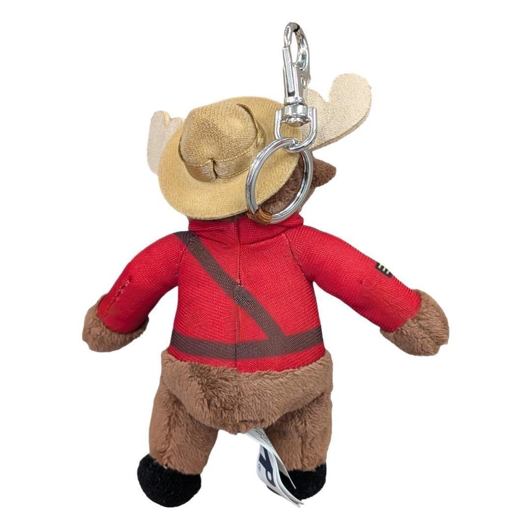 RCMP Plush Moose Keychain wearing a red ranger jacket and tan hat, shown from the back with a silver metal keyring and clasp on a plain white background.