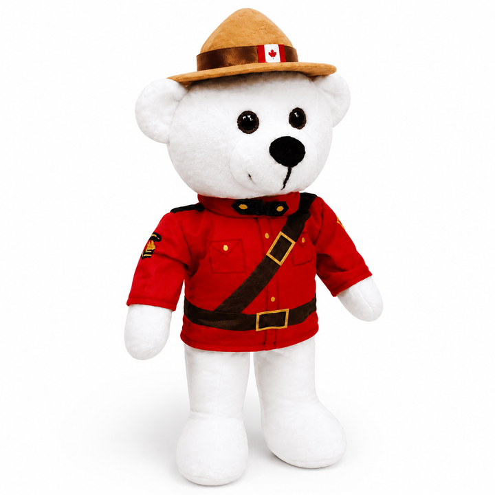 White teddy bear wearing a red Mountie uniform with a brown hat on a white background