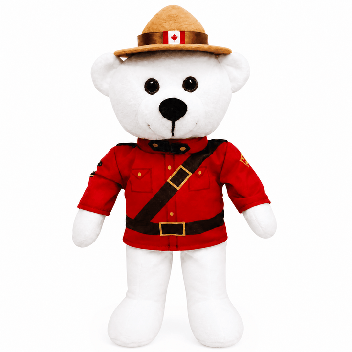 White teddy bear wearing a red Mountie uniform with a tan hat on a white background