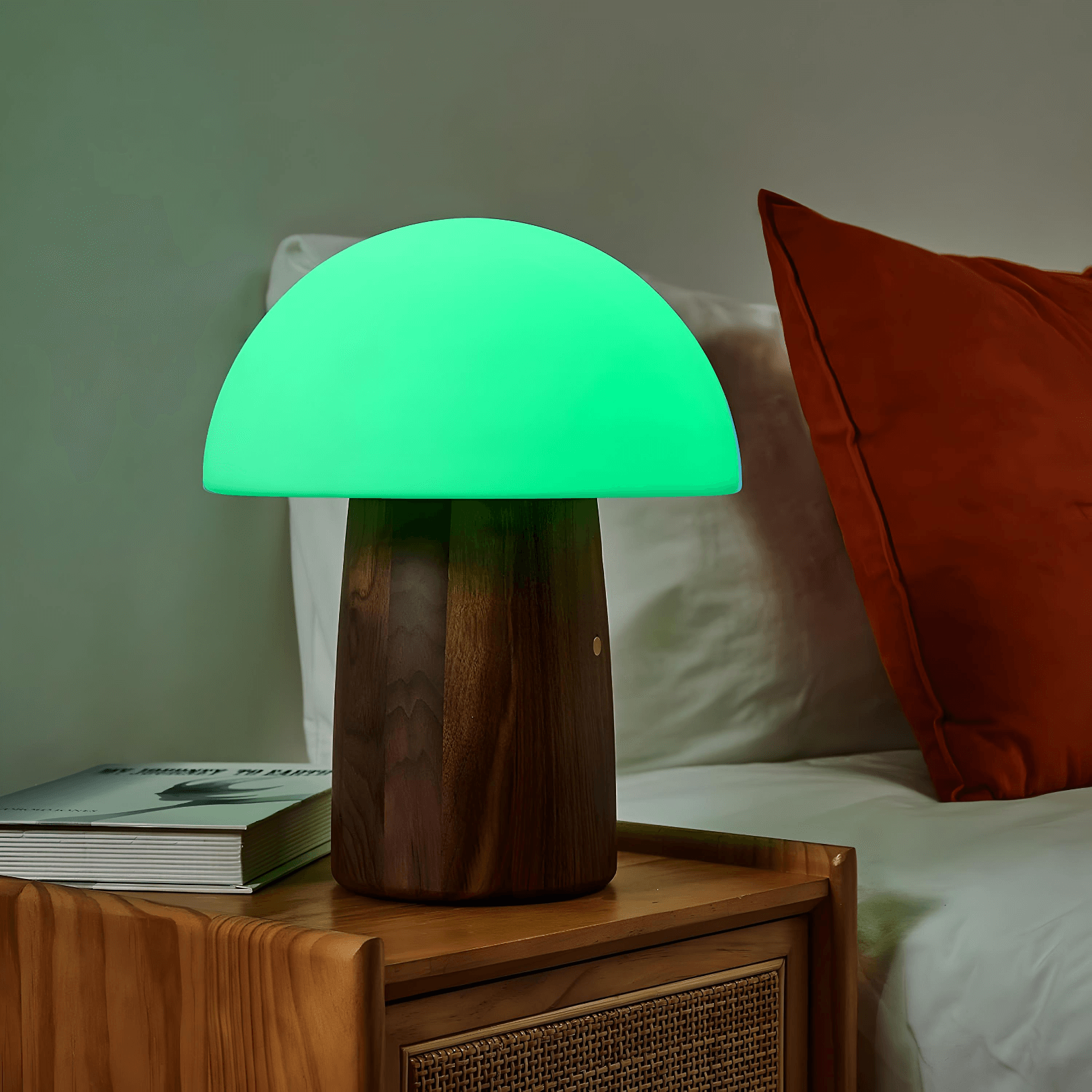 Alice Mushroom Lamp in walnut finish with glowing green top, providing whimsical lighting for home decor.