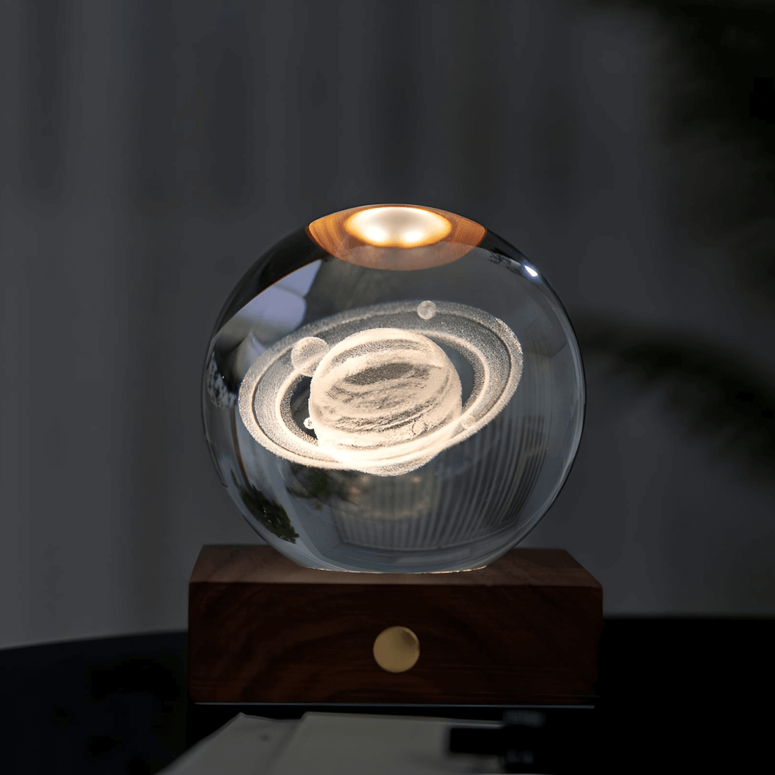 Amber Crystal Light Saturn lamp with laser-engraved Saturn design on wooden base, perfect for home decor.