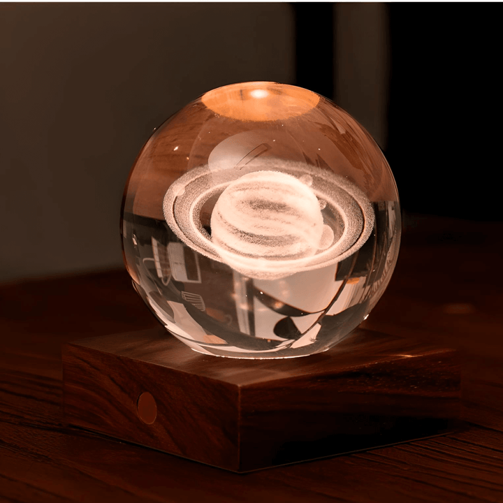 Amber Crystal Light Saturn lamp with laser-engraved Saturn design, adding elegance to any space.