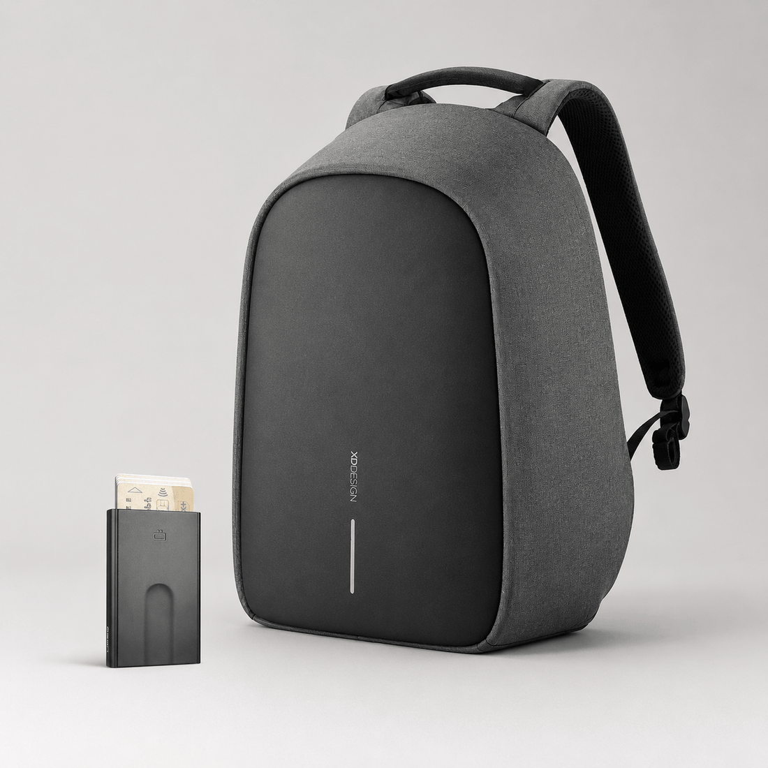 Anti-Theft Backpack and Aluminum Wallet Set featuring grey backpack and aluminum wallet