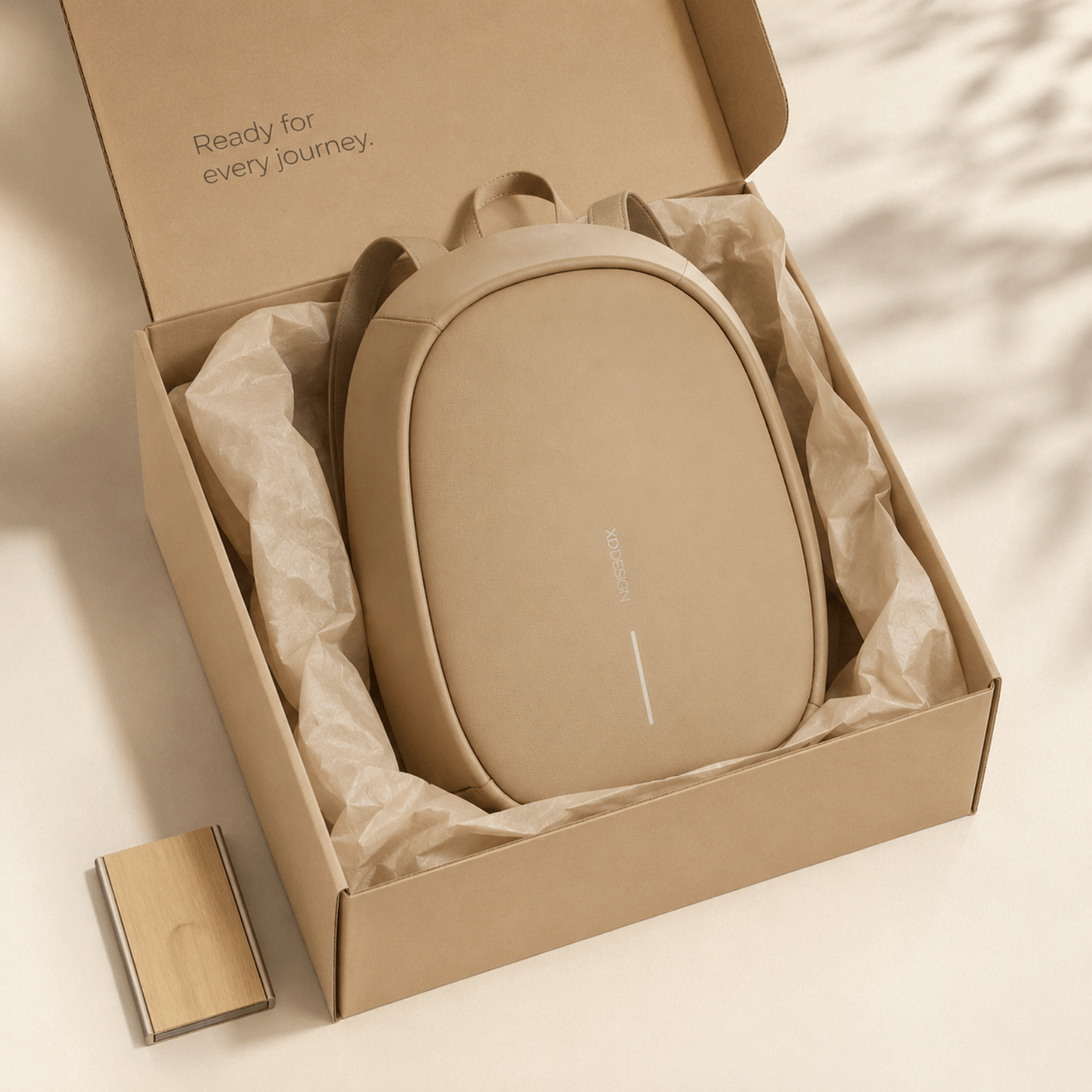 Anti-Theft Backpack and RFID Card Holder Set packaged in a box, highlighting its sleek design and travel-ready appeal.
