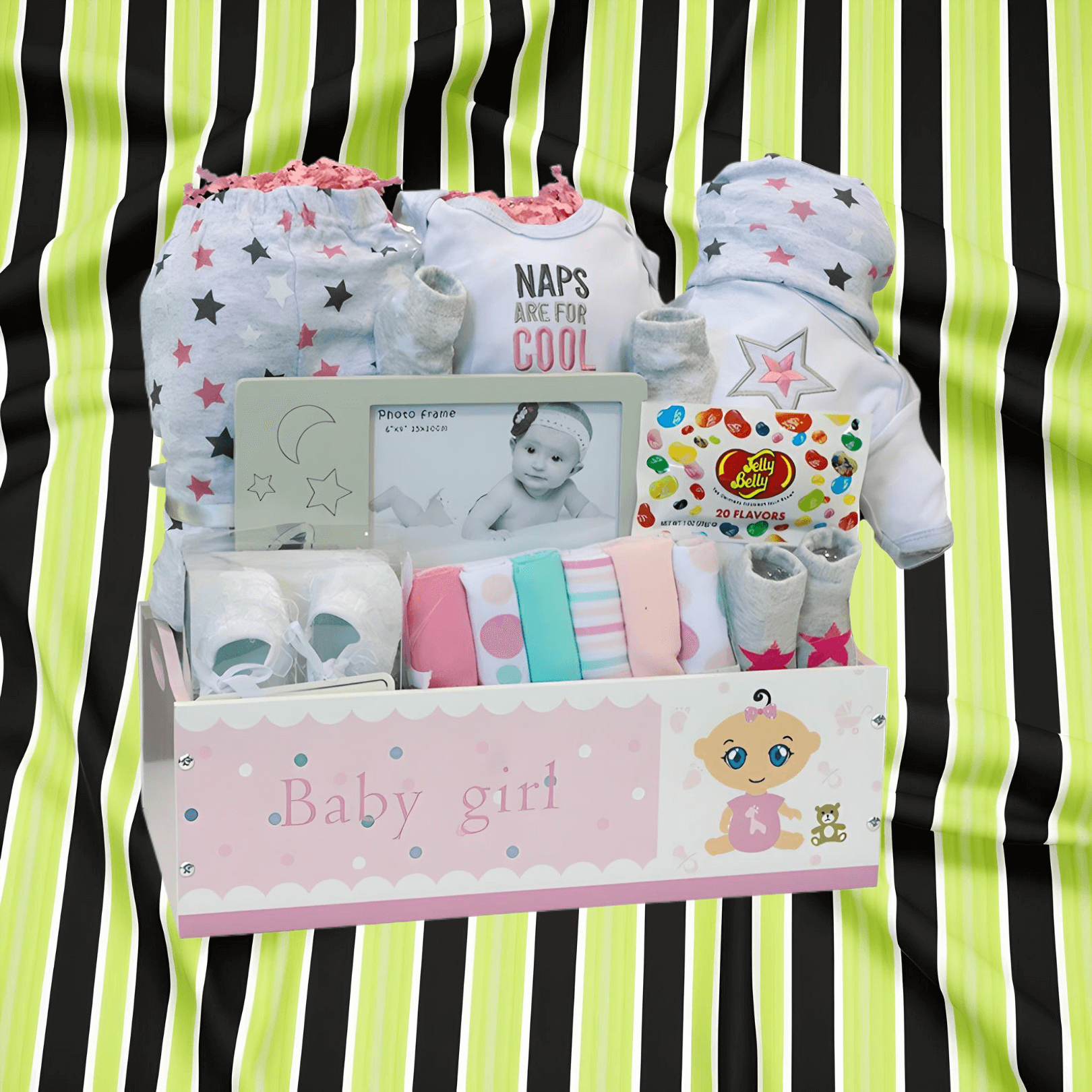 Baby Tray Gift Set for Girls featuring outfits, booties, and keepsakes on a striped background.