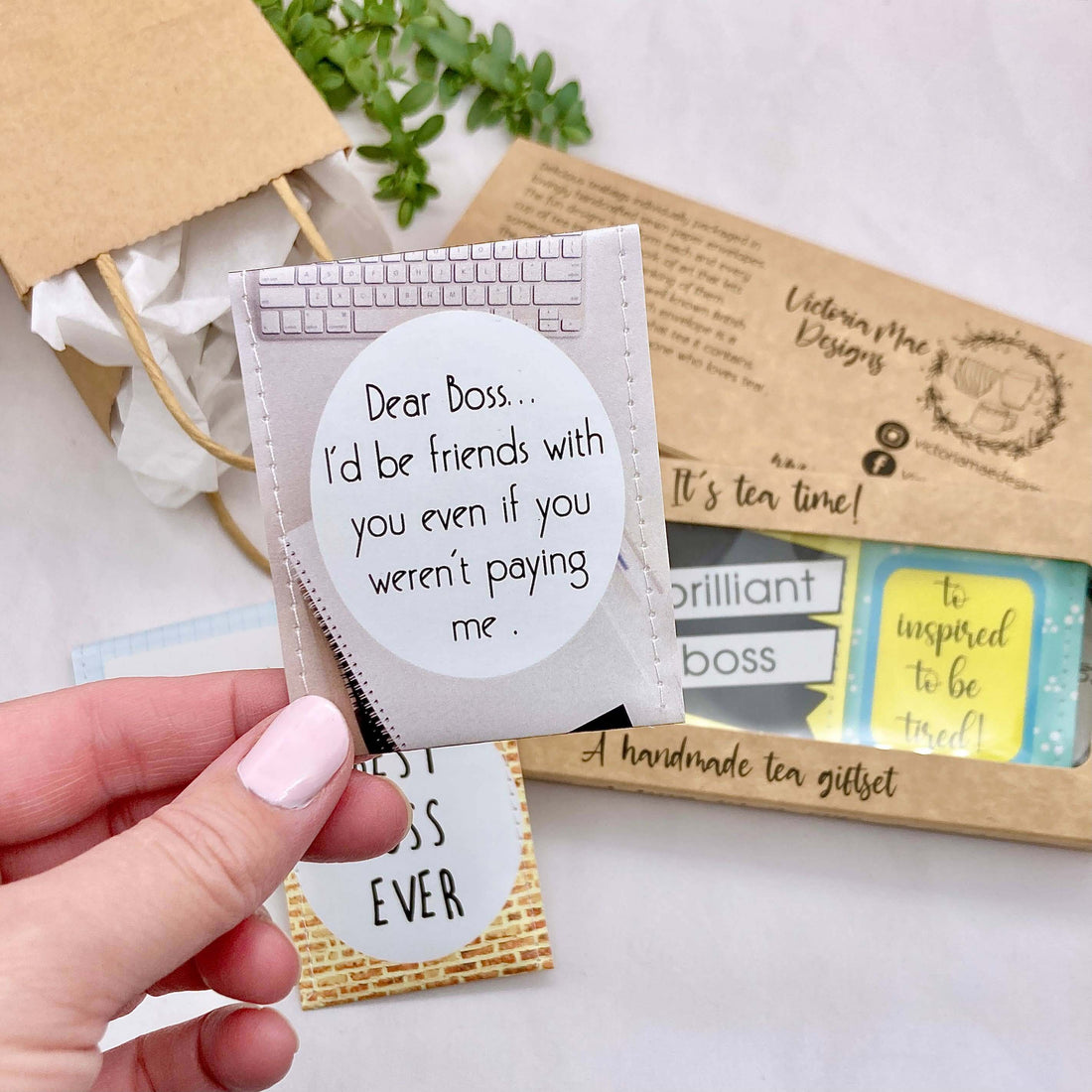 Handmade tea giftset featuring a heartfelt note for a boss, showcasing creative packaging and design.