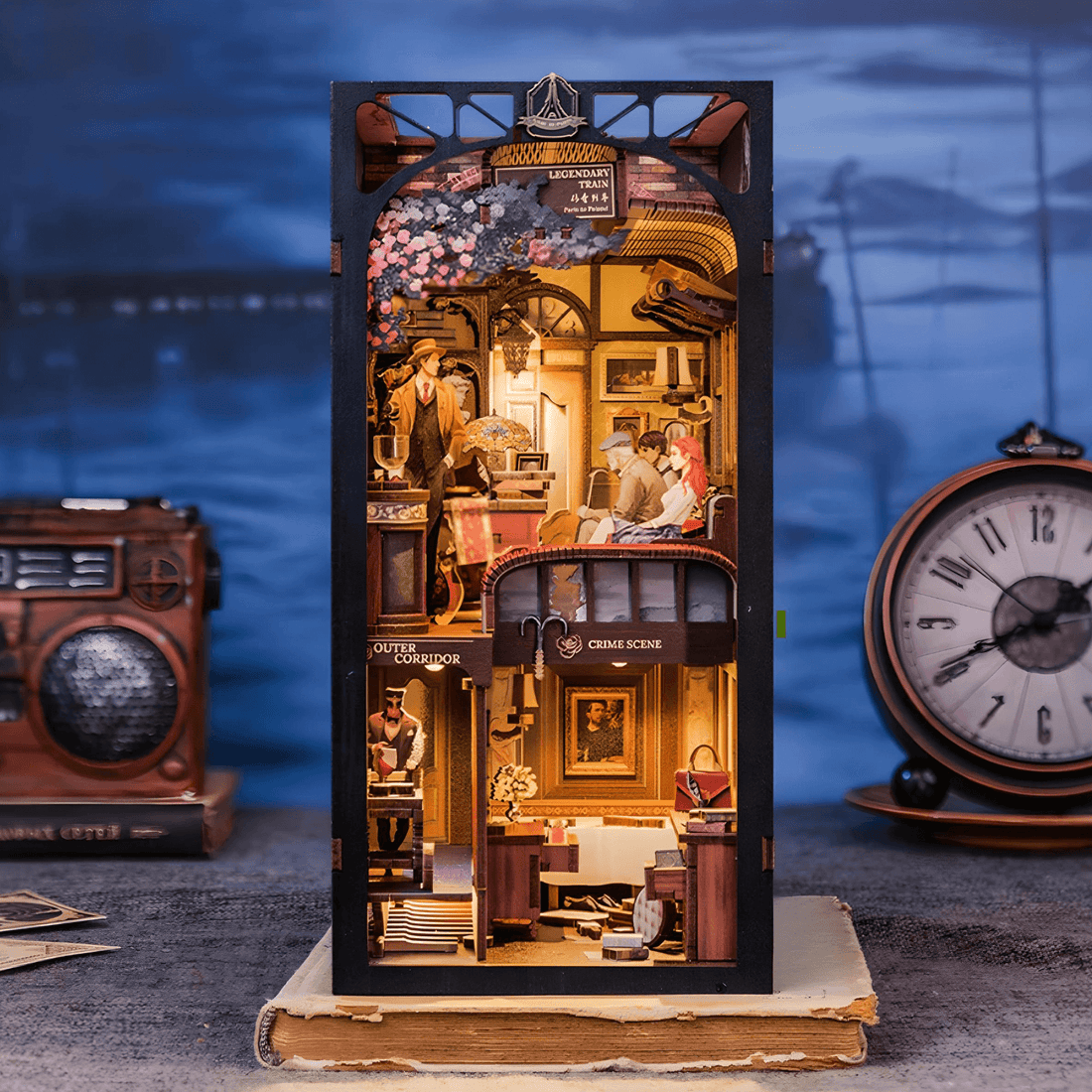 Intricately detailed DIY Book Nook Kit - Train Mystery Case diorama, featuring scenes from a crime mystery.