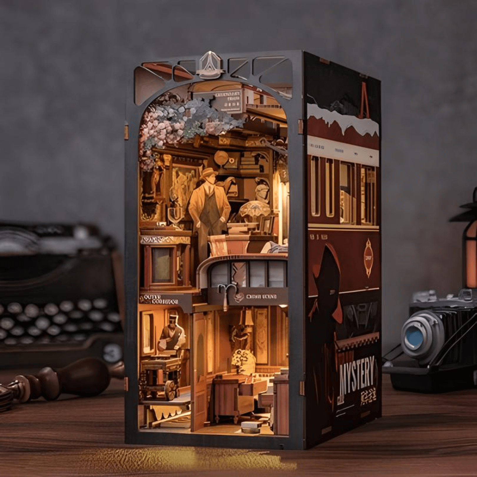 DIY Book Nook Kit - Train Mystery Case with intricate details and diorama scene, showcasing craftsmanship and intrigue.