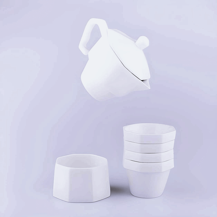 DOIY WithCoffee Moka Pot Set featuring a moka pot, stacked espresso cups, and ceramic serving bowl in elegant white design.