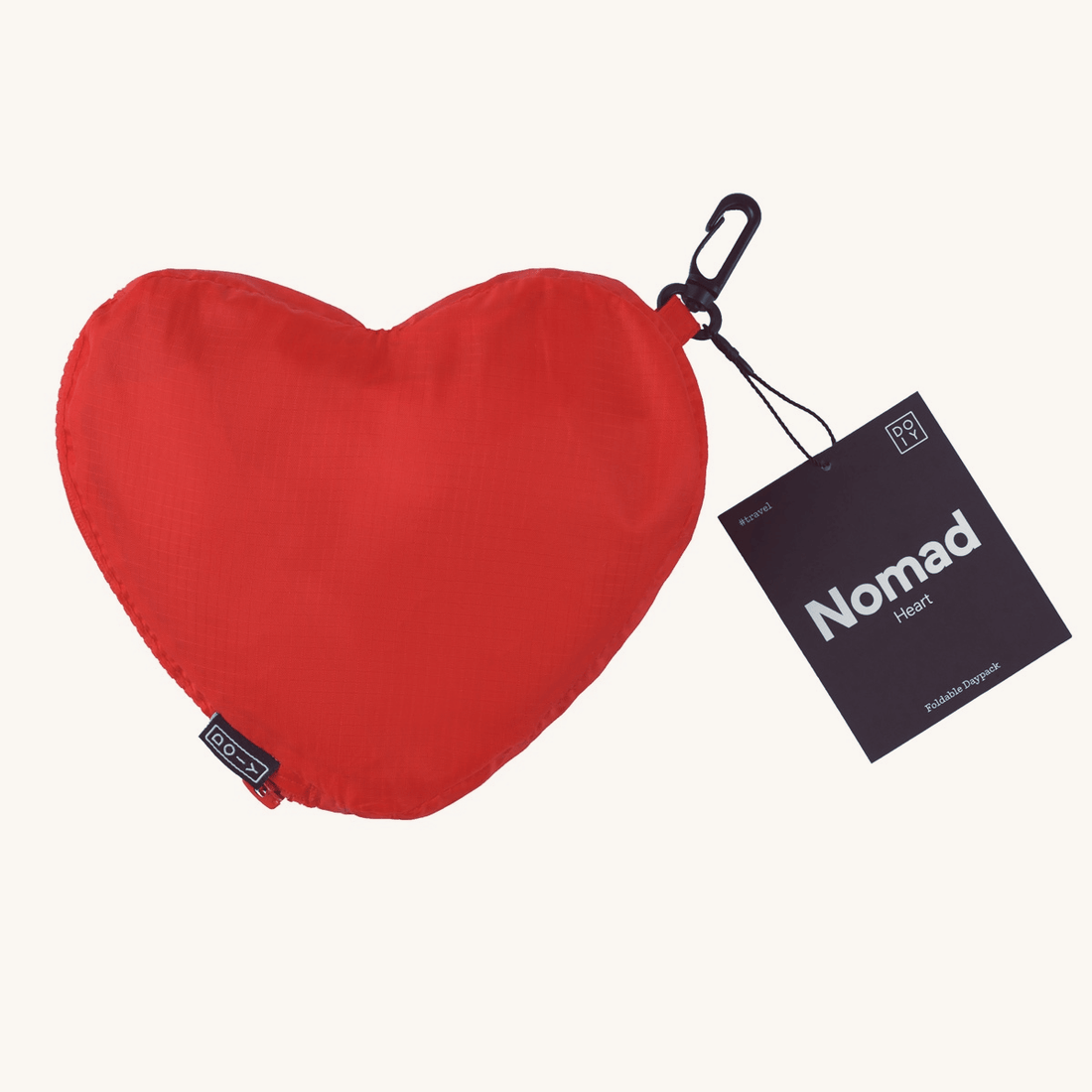 Nomad Heart Foldable Backpack in red, compact design with clip for travel convenience.