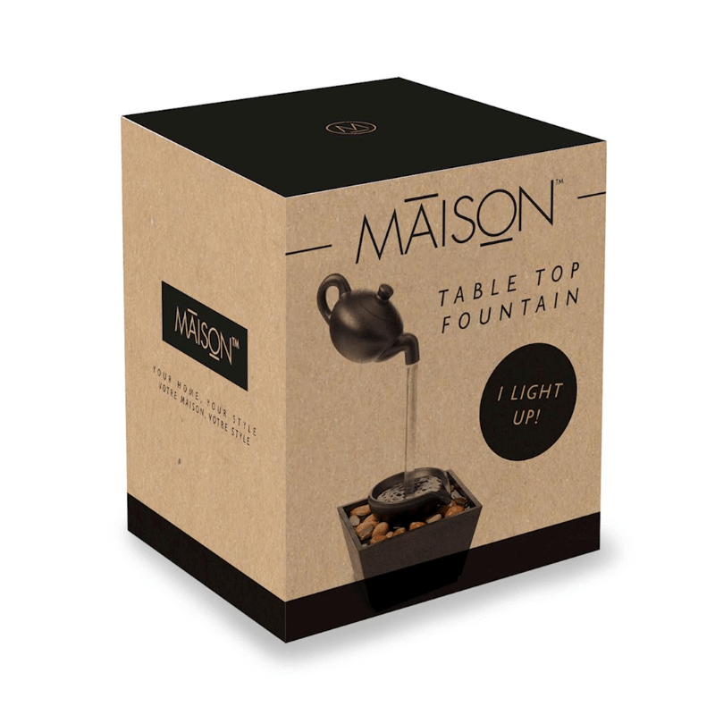 Maison tabletop fountain packaging featuring a floating teapot design and LED light.