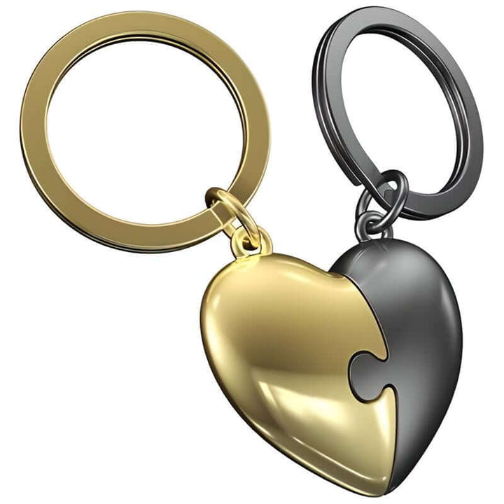 Heart Puzzle Keychain  featuring a black and gold heart puzzle piece keyring connected together.