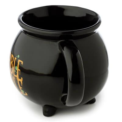 Hubble Bubble Cauldron Mug, a black ceramic mug shaped like a cauldron with spooky details and orange lettering.