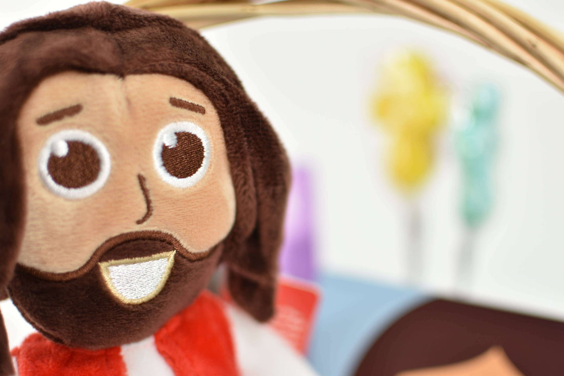 Cuddly Jesus doll with smiling face, perfect for kids' storytelling and snuggling.