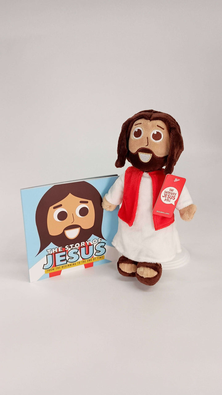 Jesus doll and book bundle featuring a plush Jesus toy with a smiling face and a colorful storybook for kids.