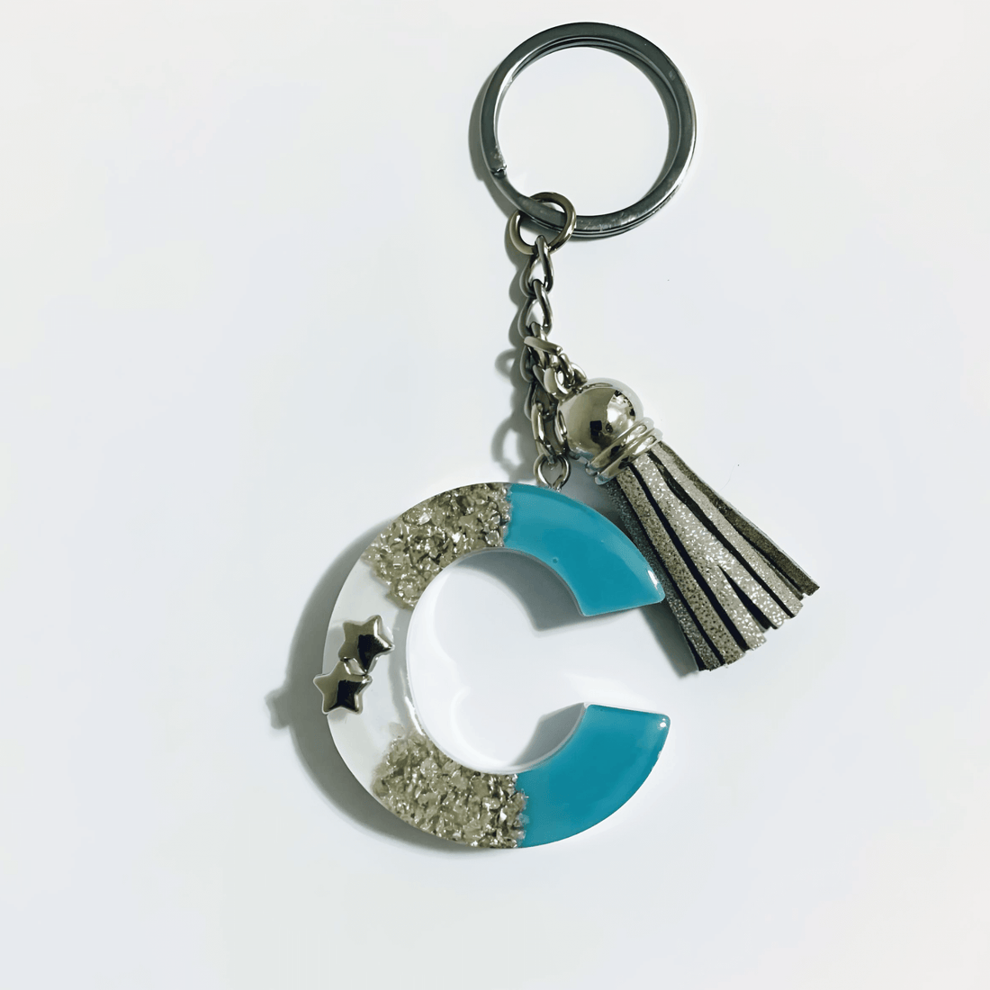 Letter C Resin Keychain – Blue & White Marbled Charm with silver and blue accents.