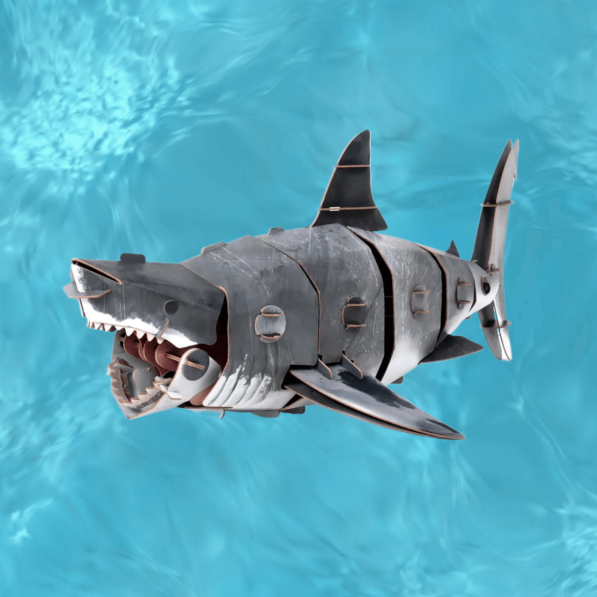 Makebug Great White Shark 3D Paper Puzzle in a vibrant blue underwater setting.