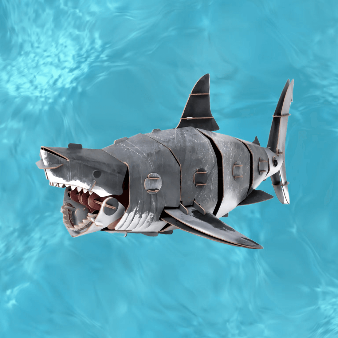 Makebug Great White Shark 3D Paper Puzzle in a vibrant blue underwater setting.