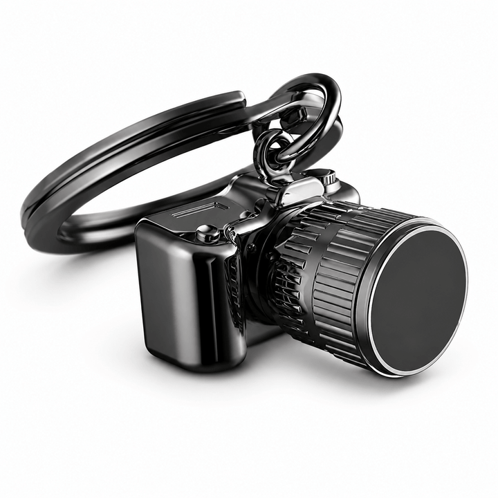 Metalmorphose Camera Keychain in dark gunmetal with detailed camera body, textured lens, and black key ring