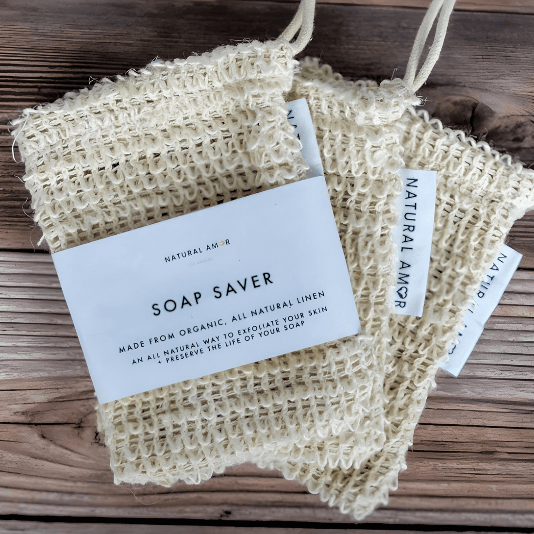 Natural Amor Soap Saver bags made from organic linen for gentle exfoliation and soap preservation.