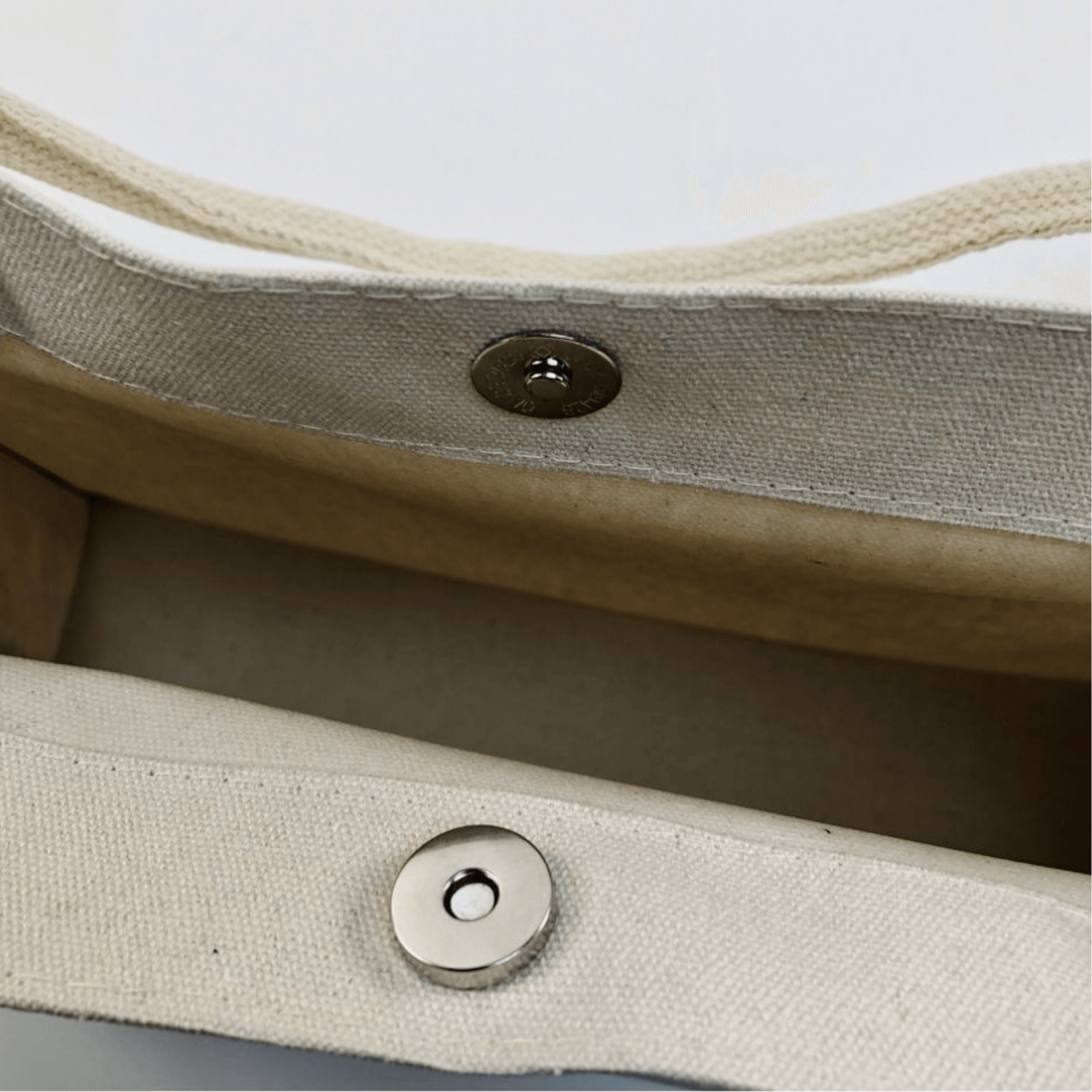 Interior view of the Oil Painting Canvas Tote Bag showcasing the snap closure and spacious design.