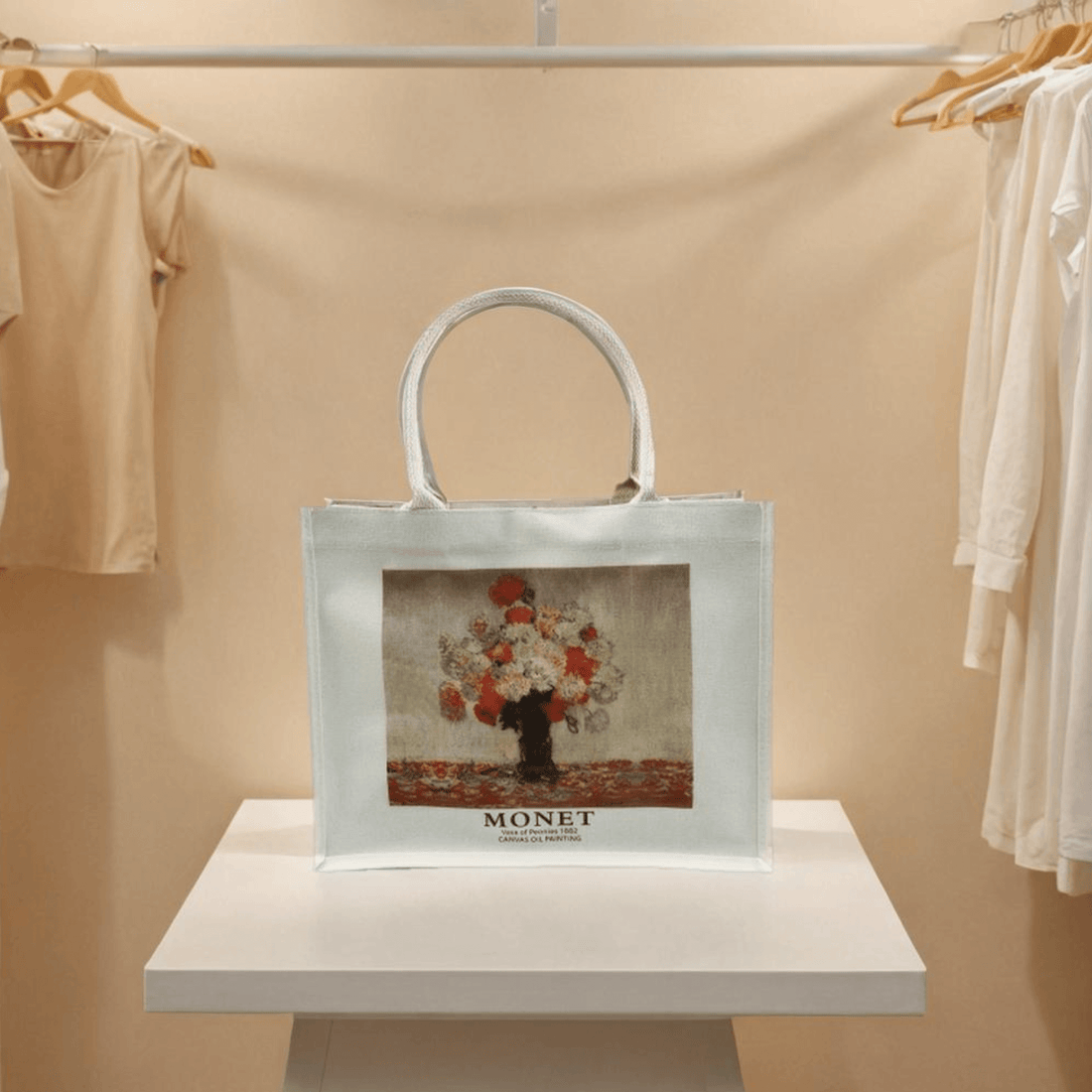 Canvas tote bag featuring Monet's Vase of Peonies artwork, perfect for stylish everyday use.