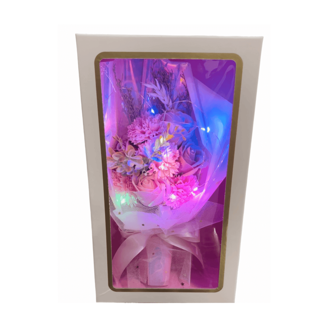 Pink flower bouquet illuminated with LED string lights in an elegant gift box, showcasing a blend of soft and deep pink hues.