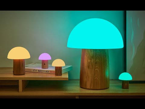 Whimsical Alice Mushroom Lamp in walnut, featuring 7 rotating RGB lights for a magical ambiance in any room.