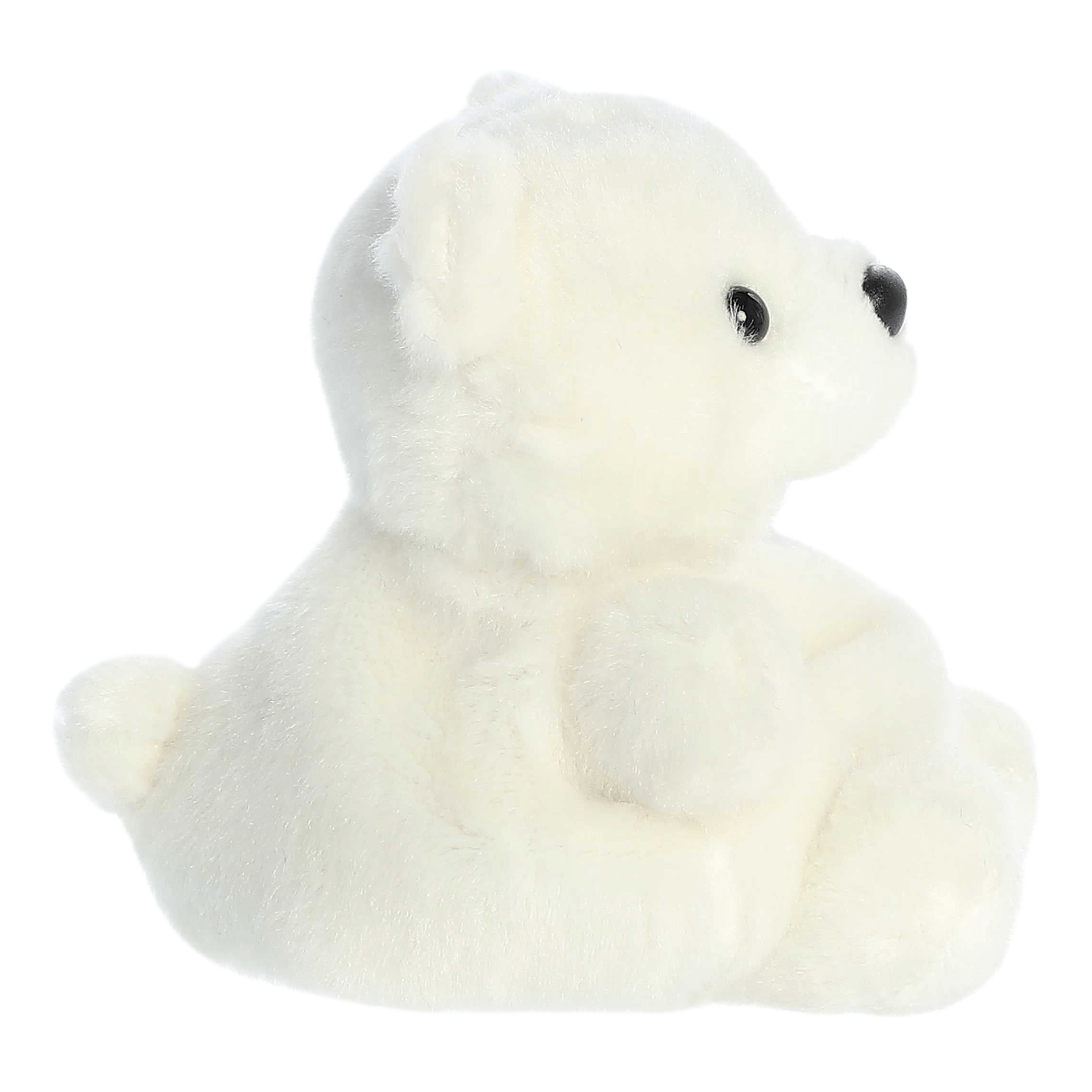 Soft and cuddly Puck Polar Bear plush toy with white fur and black eyes, perfect for cozy moments and gift-giving.