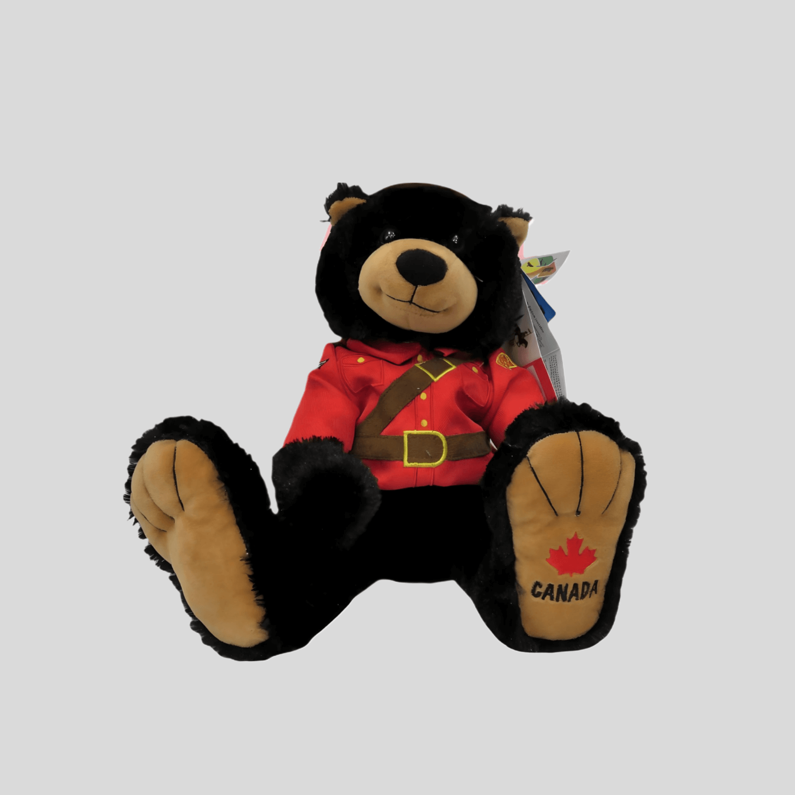 RCMP Big Foot Bear Plush Toy, 14-inch black bear in red Mountie uniform, Canadian pride, perfect for cuddling.