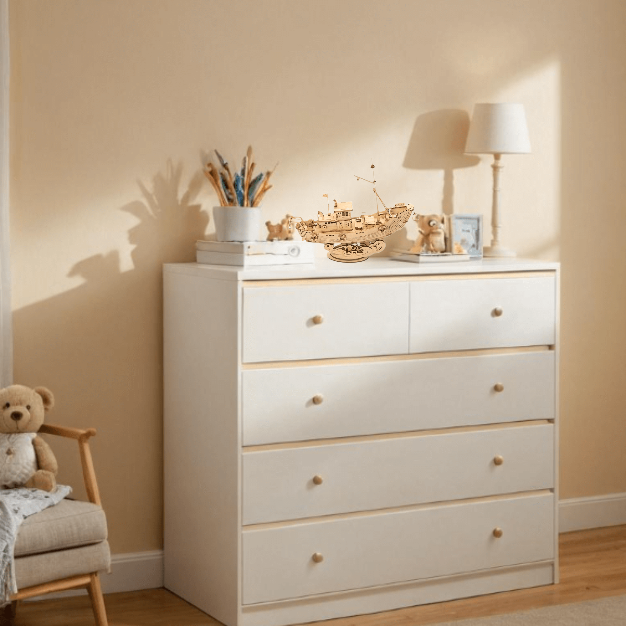 Rolife Fishing Ship 3D Wooden Puzzle displayed on a dresser in a cozy room setting.