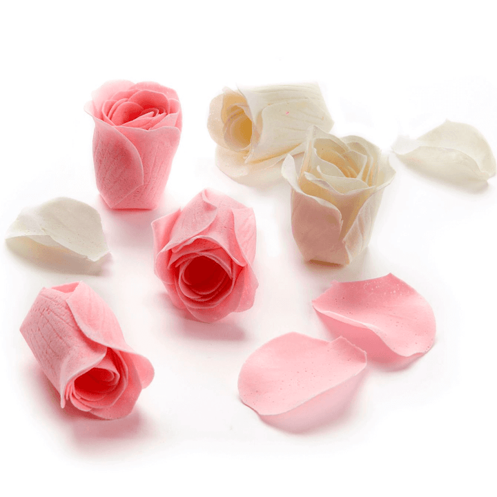 Set of pink and white soap petals resembling flower blossoms, perfect for gifts or decoration.