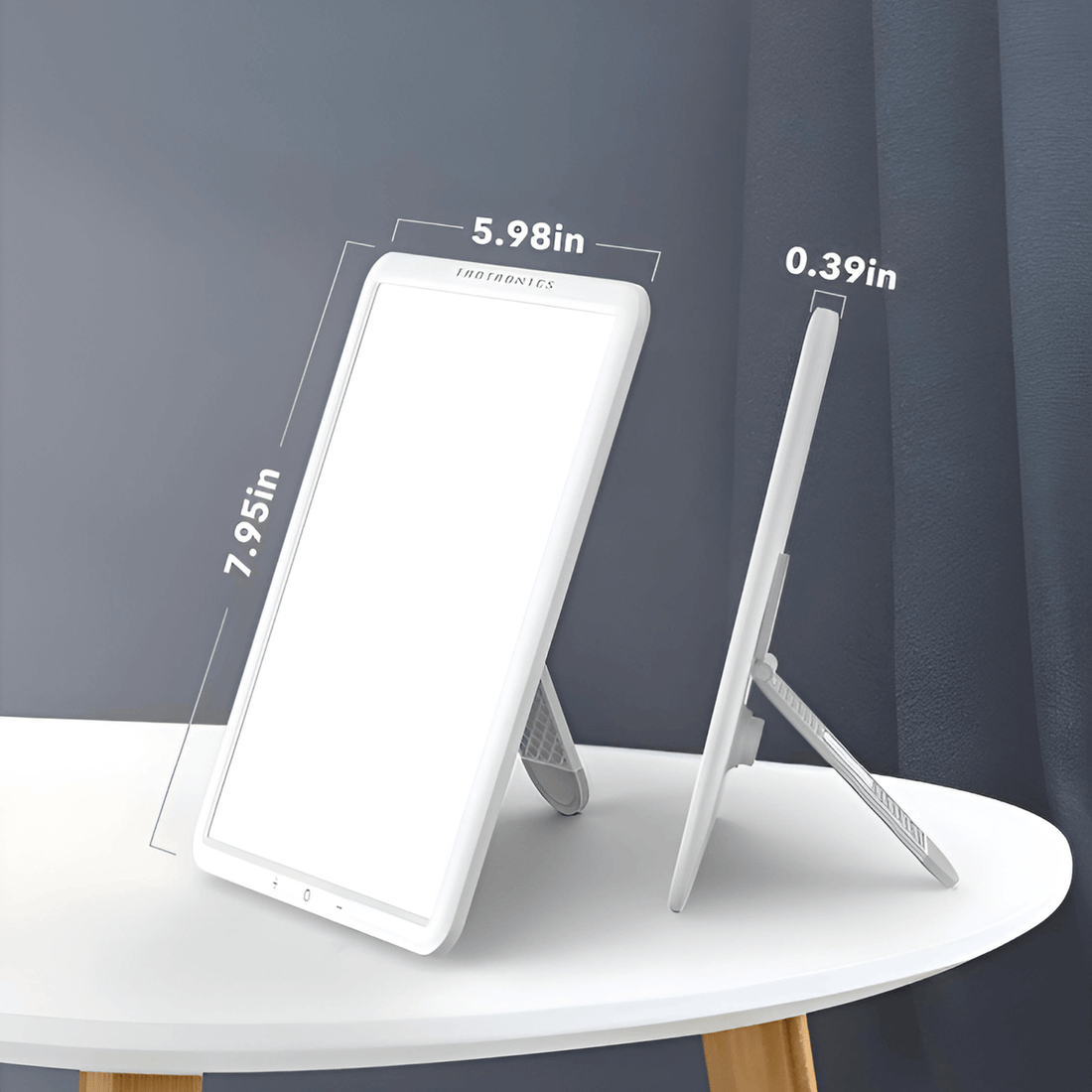 TaoTronics Light Therapy Lamp dimensions on a table, displaying ultra-slim design and modern aesthetic.